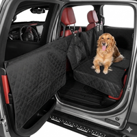 Halviar Black backseat extender installed in SUV with dog